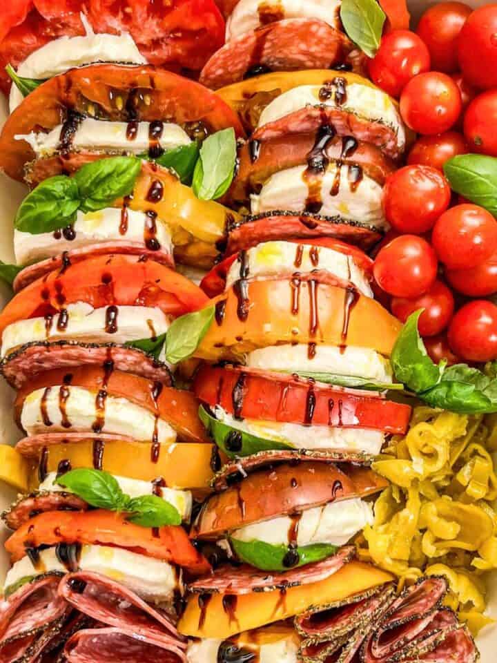Antipasto caprese salad in a baking dish.