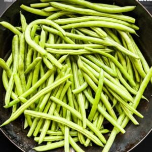 Green beans in a large skillet.