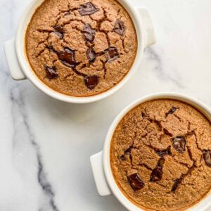 Two ramekins of chocolate baked oats.