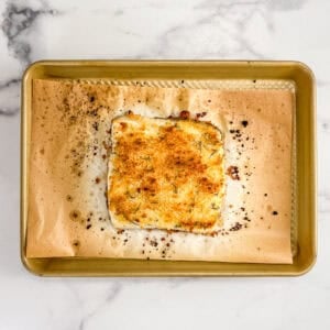 Parmesan panko baked halibut on a sheet pan.