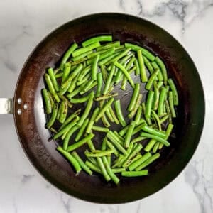 Green beans in a large pan.