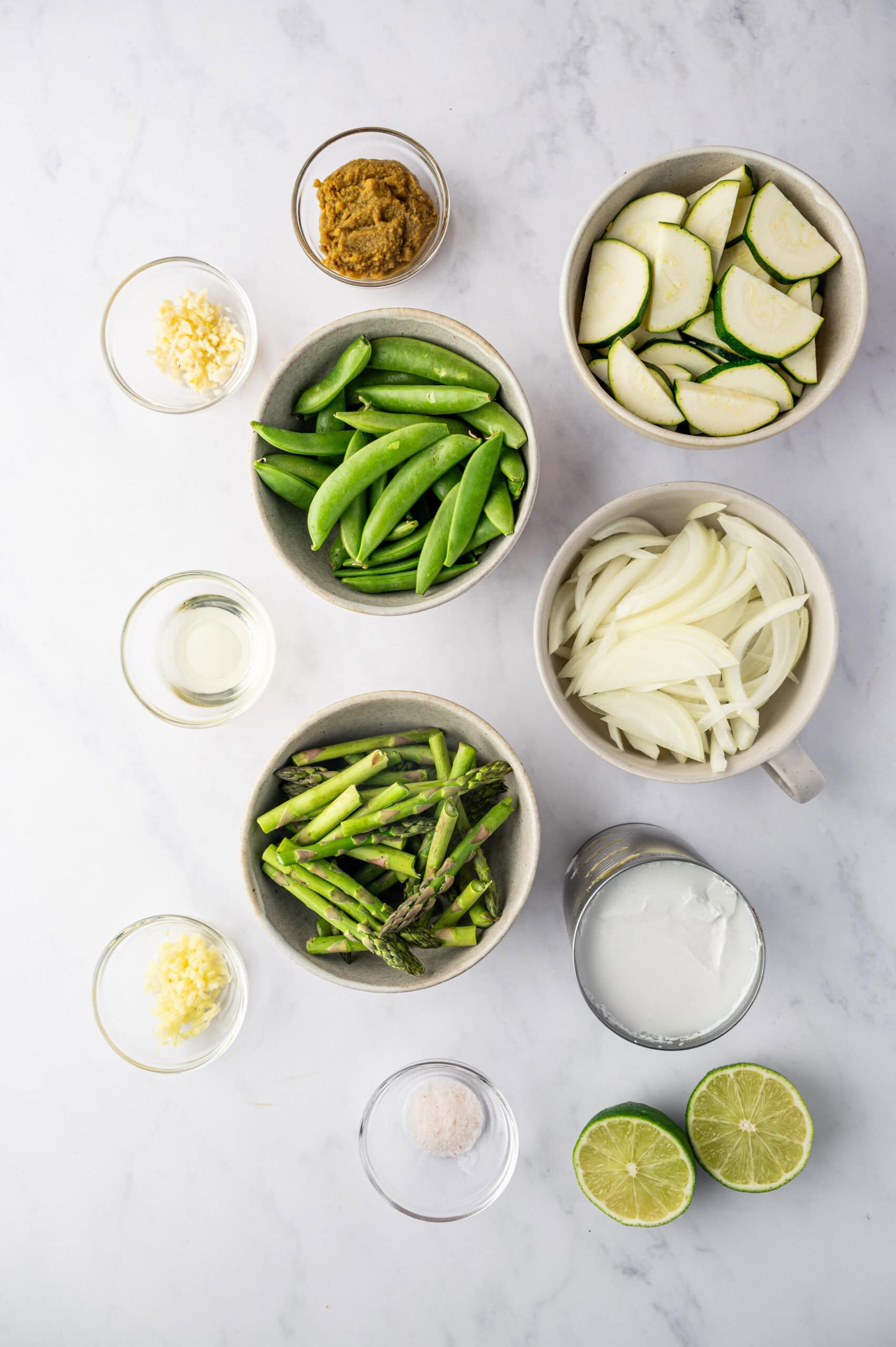 Thai green curry ingredients in bowls.