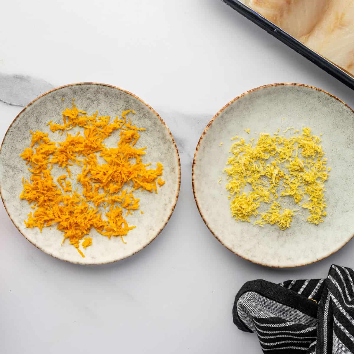 Orange and lemon zest drying on plates.