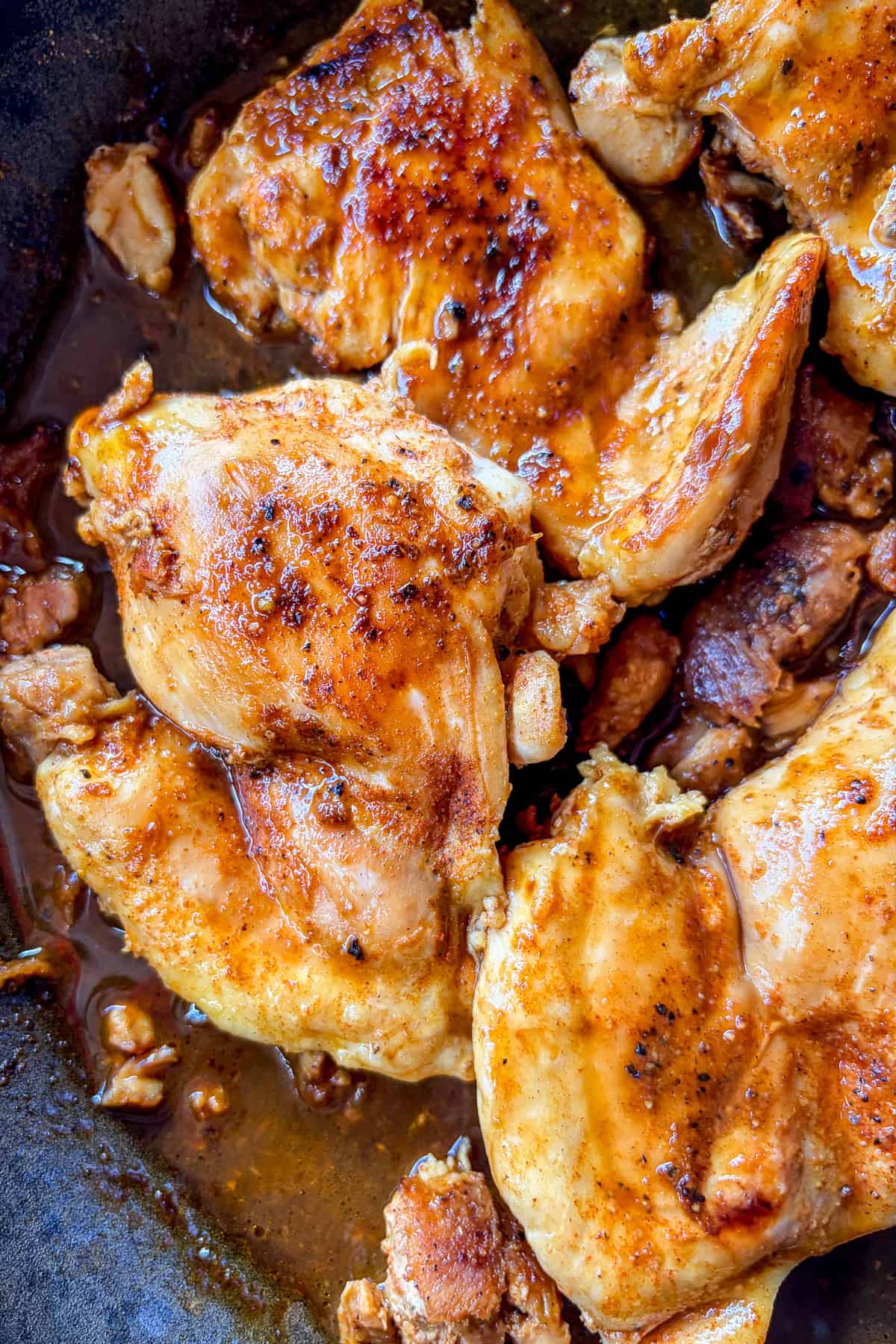 Easy sauteed chicken thighs in a skillet.