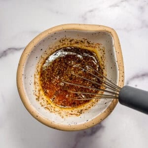 Greek marinade in a small bowl.
