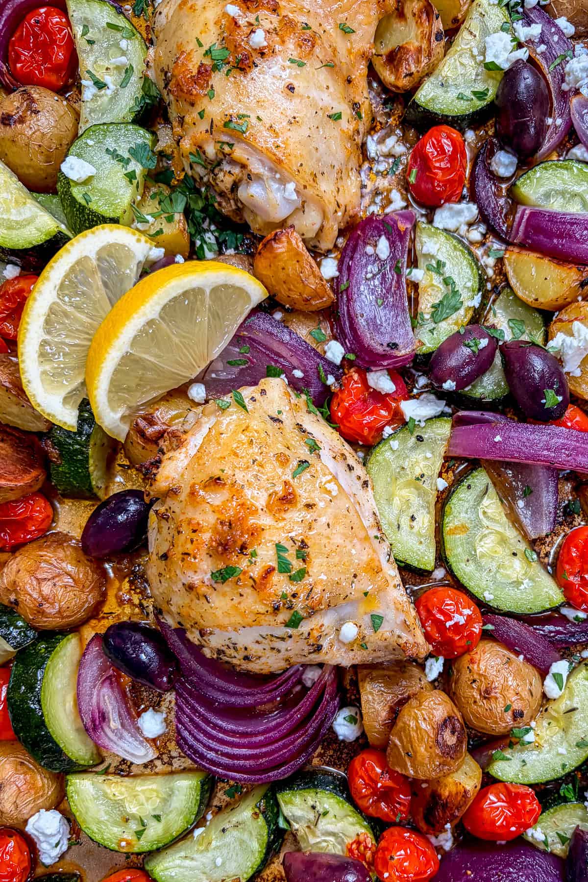 Greek chicken thighs and veggies dinner recipe.